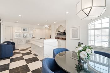 A black and white checkered floor in a well lit room